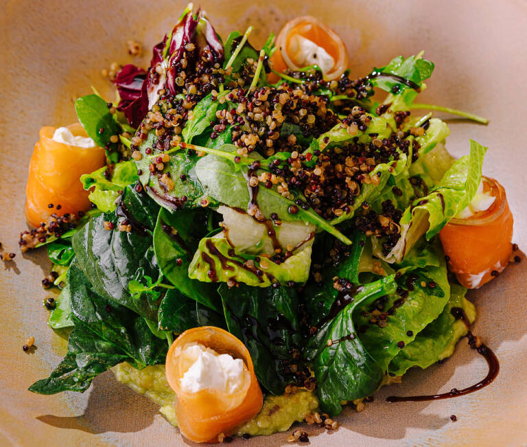 fresh gourmet salmon salad on elegant plate